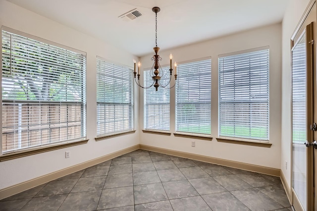 7341 Chadwick Dr, Mckinney, TX 75072 - unfurnished dining area featuring a chandelier, healthy amount of natural light, tile patterned floors, and baseboards