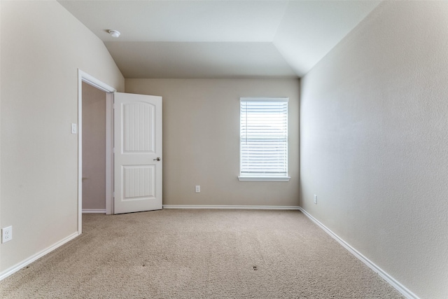 5212 Sugarcane Ln, Fort Worth, TX 76179 - carpeted spare room with baseboards, a smoke detector, and lofted ceiling
