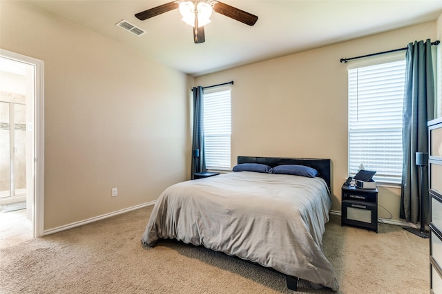 5212 Sugarcane Ln, Fort Worth, TX 76179 - bedroom featuring light carpet, baseboards, ceiling fan, and ensuite bath