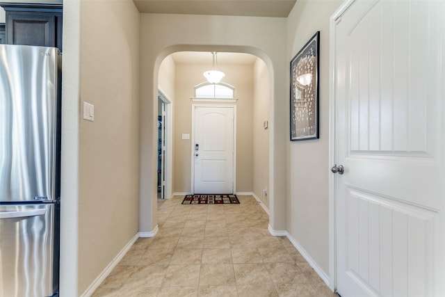 5212 Sugarcane Ln, Fort Worth, TX 76179 - foyer with arched walkways and baseboards