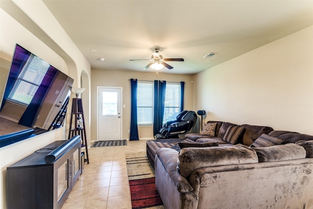 5212 Sugarcane Ln, Fort Worth, TX 76179 - living area with a ceiling fan, healthy amount of natural light, light tile patterned floors, and baseboards