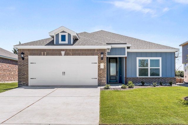 1025 Pecan Pl, Hutchins, TX 75141 - view of front facade featuring brick siding, a garage, a front yard, and a shingled roof