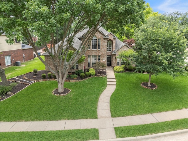 1 Parkside Cir, Allen, TX 75013 - traditional-style house featuring a front lawn, brick siding, stone siding, and roof with shingles