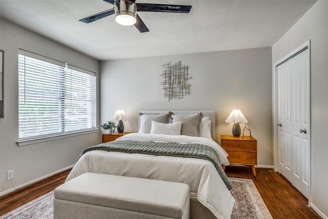 5010 N Hall St Unit C, Dallas, TX 75235 - bedroom featuring dark wood-type flooring, baseboards, and ceiling fan