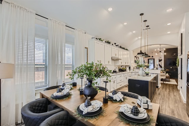3906 Chesapeake Ln, Crandall, TX 75114 - dining space featuring a chandelier, vaulted ceiling, light wood-type flooring, and recessed lighting