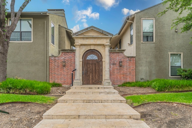 5806 Birchbrook Dr Unit 203, Dallas, TX 75206 - entrance to property with stucco siding and brick siding