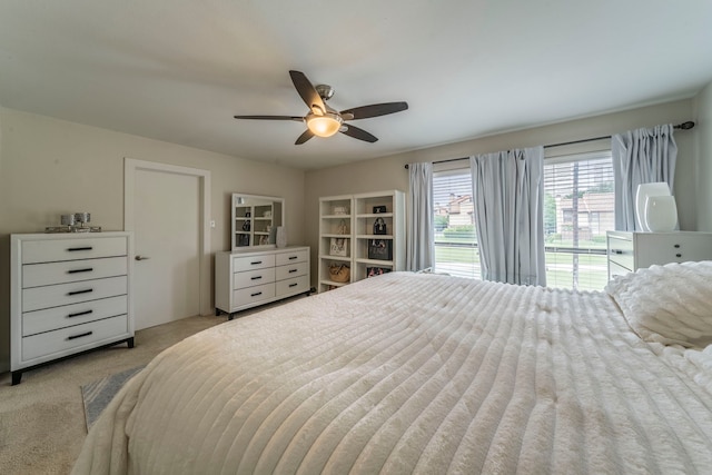 5806 Birchbrook Dr Unit 203, Dallas, TX 75206 - bedroom featuring carpet floors and a ceiling fan