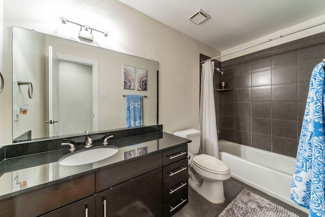 5806 Birchbrook Dr Unit 203, Dallas, TX 75206 - full bath with tile patterned flooring, shower / bath combo, vanity, and toilet