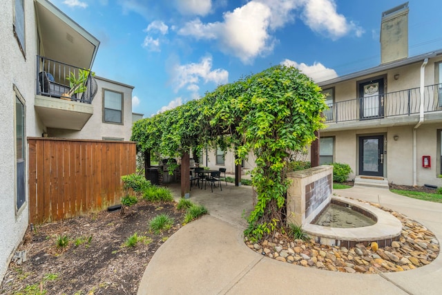 5806 Birchbrook Dr Unit 203, Dallas, TX 75206 - view of home's community featuring a patio area and outdoor dining space