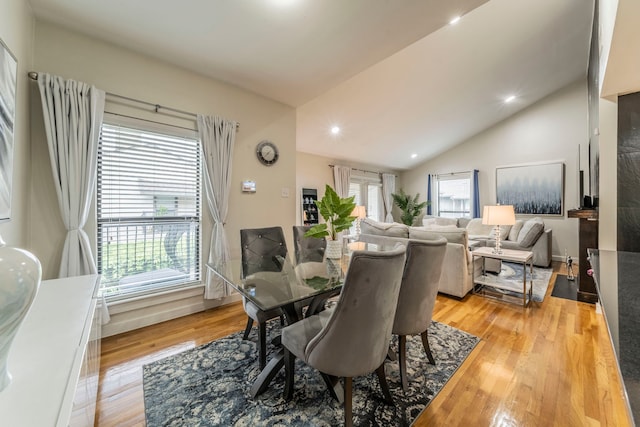 5806 Birchbrook Dr Unit 203, Dallas, TX 75206 - dining room with light wood-type flooring, lofted ceiling, and recessed lighting