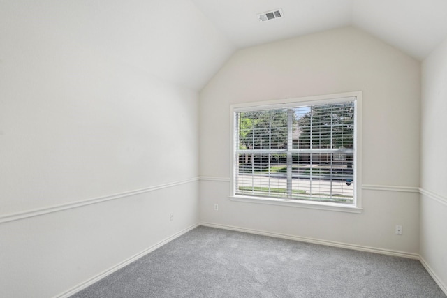 1280 Seymour Dr, Frisco, TX 75034 - unfurnished room featuring vaulted ceiling, carpet, and baseboards