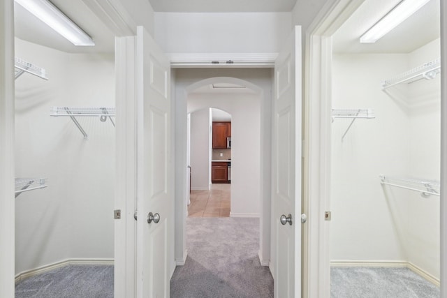 1280 Seymour Dr, Frisco, TX 75034 - spacious closet with light carpet and arched walkways