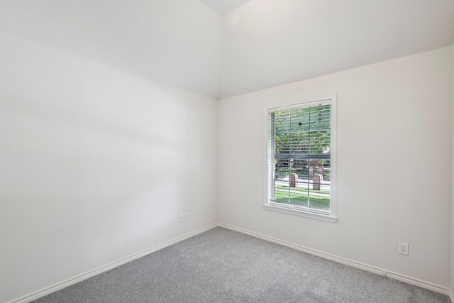1280 Seymour Dr, Frisco, TX 75034 - carpeted empty room with vaulted ceiling and baseboards