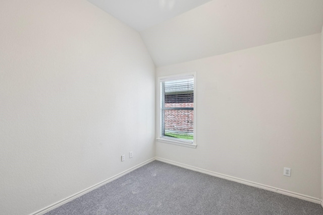1280 Seymour Dr, Frisco, TX 75034 - unfurnished room featuring dark colored carpet, lofted ceiling, and baseboards