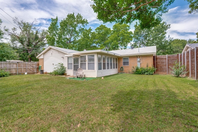 2002 Winthrop St, Irving, TX 75061 - back of property featuring a sunroom