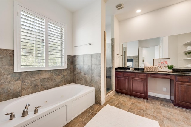 1400 Clarinet Ln, Plano, TX 75074 - bathroom featuring a whirlpool tub, double vanity, and a shower stall