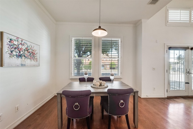 1400 Clarinet Ln, Plano, TX 75074 - dining space featuring healthy amount of natural light, wood finished floors, baseboards, and ornamental molding