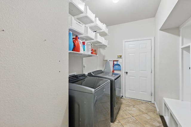 163 Las Colinas Trl, Cross Roads, TX 76227 - laundry area with independent washer and dryer and light tile patterned floors