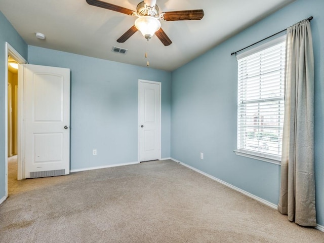8924 Holliday Ln, Aubrey, TX 76227 - unfurnished bedroom featuring carpet, multiple windows, and baseboards