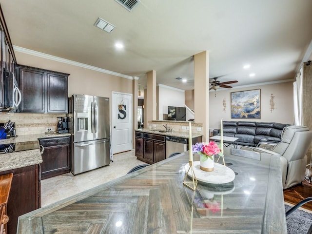 8924 Holliday Ln, Aubrey, TX 76227 - dining area with crown molding, ceiling fan, and recessed lighting