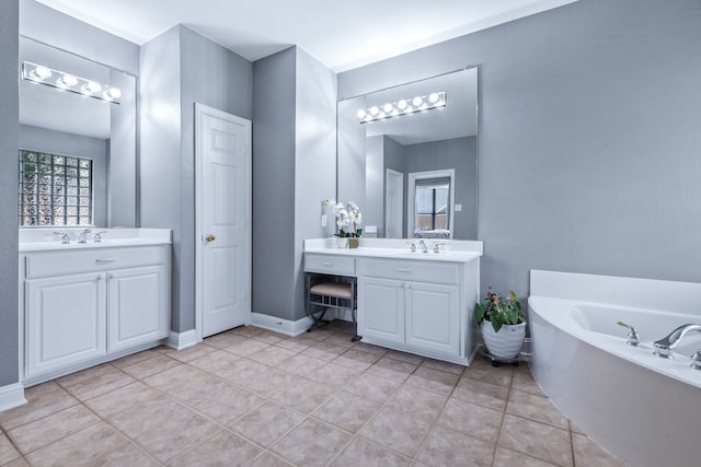 8905 Glen Garden Dr, Mckinney, TX 75072 - full bath with a bath, tile patterned floors, and two vanities
