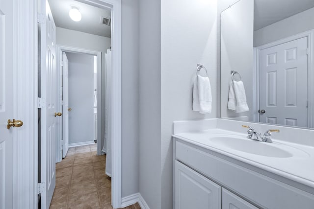 8905 Glen Garden Dr, Mckinney, TX 75072 - full bathroom featuring vanity and baseboards