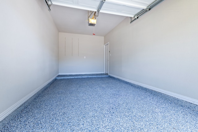 8905 Glen Garden Dr, Mckinney, TX 75072 - garage with a garage door opener and baseboards