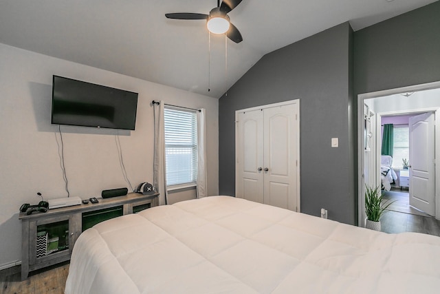 4408 Ashbury Ln, Mansfield, TX 76063 - bedroom with wood finished floors, lofted ceiling, a closet, and a ceiling fan
