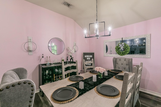 4408 Ashbury Ln, Mansfield, TX 76063 - dining space featuring a chandelier, wood finished floors, baseboards, and vaulted ceiling