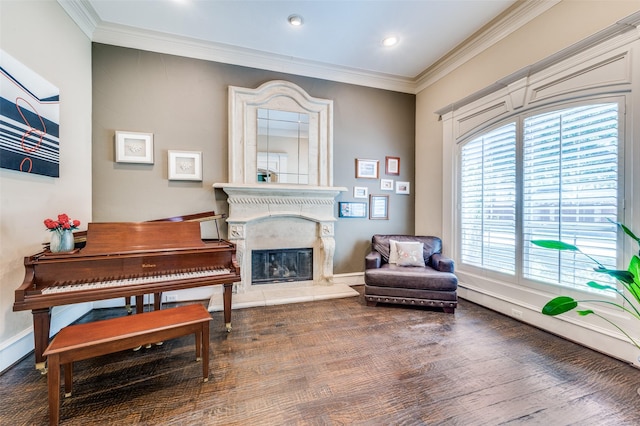 2458 W Creek Dr, Frisco, TX 75033 - sitting room with crown molding, wood finished floors, a high end fireplace, recessed lighting, and baseboards