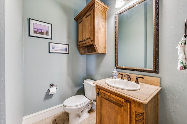 2458 W Creek Dr, Frisco, TX 75033 - bathroom featuring vanity, toilet, tile patterned flooring, and baseboards