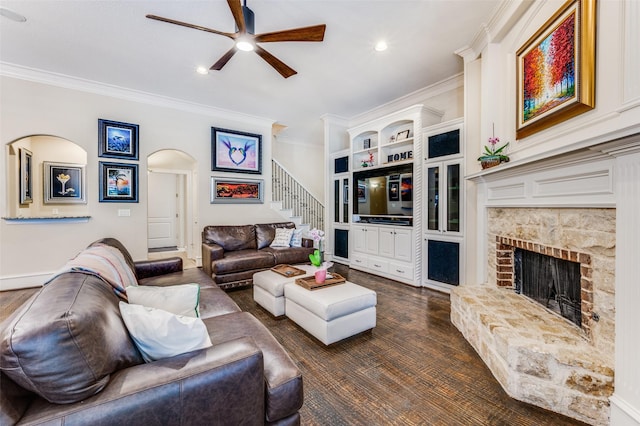 2458 W Creek Dr, Frisco, TX 75033 - living room with a ceiling fan, stairs, crown molding, built in features, and a stone fireplace