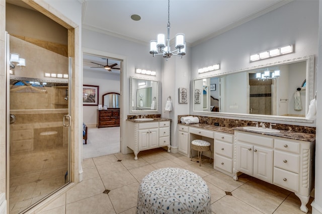 2458 W Creek Dr, Frisco, TX 75033 - bathroom featuring a chandelier, a shower stall, tile patterned flooring, vanity, and crown molding
