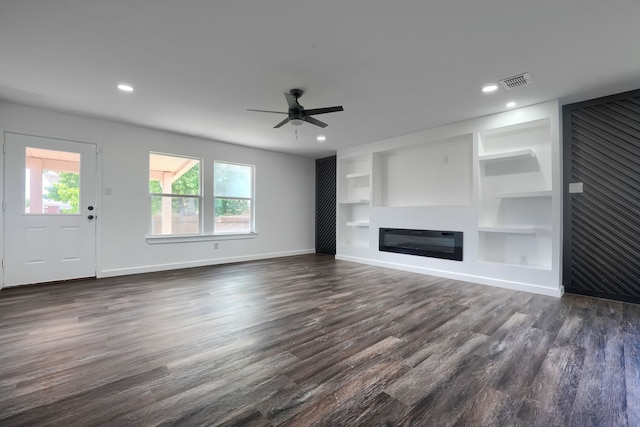 1722 Harvest Crossing Dr, Wylie, TX 75098 - unfurnished living room with a glass covered fireplace, plenty of natural light, ceiling fan, baseboards, and recessed lighting
