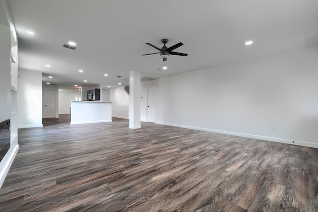1722 Harvest Crossing Dr, Wylie, TX 75098 - unfurnished living room featuring dark wood finished floors, baseboards, ceiling fan, and recessed lighting