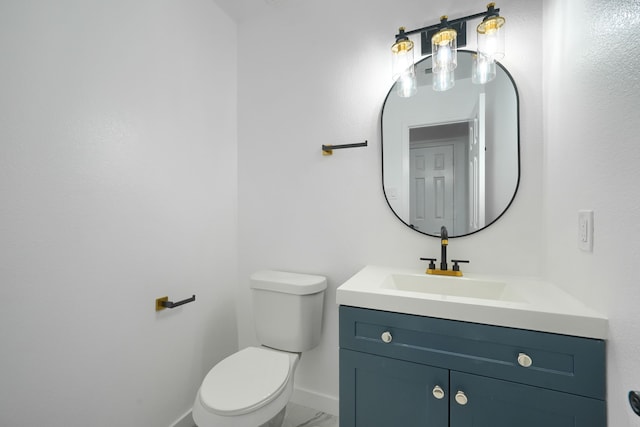1722 Harvest Crossing Dr, Wylie, TX 75098 - half bathroom with vanity, toilet, baseboards, and marble look tile flooring