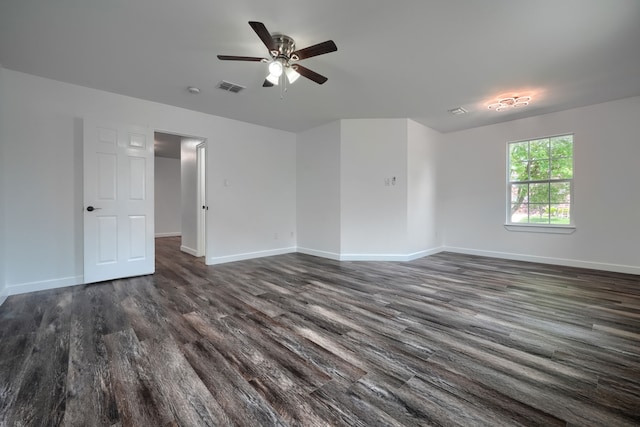 1722 Harvest Crossing Dr, Wylie, TX 75098 - empty room with dark wood-style flooring, ceiling fan, and baseboards