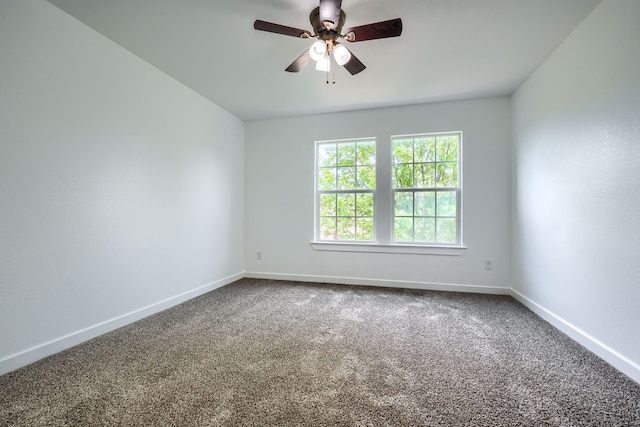 1722 Harvest Crossing Dr, Wylie, TX 75098 - empty room featuring dark carpet, baseboards, and a ceiling fan