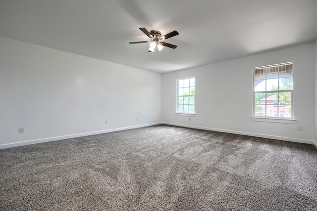 1722 Harvest Crossing Dr, Wylie, TX 75098 - empty room with ceiling fan, baseboards, and dark colored carpet