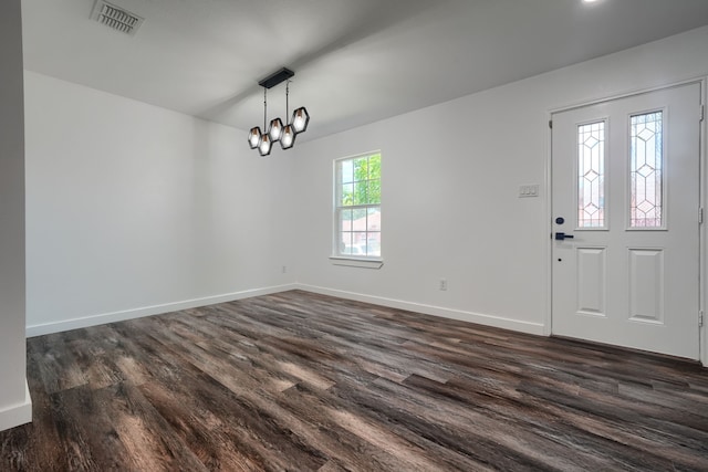 1722 Harvest Crossing Dr, Wylie, TX 75098 - foyer featuring dark wood finished floors and baseboards