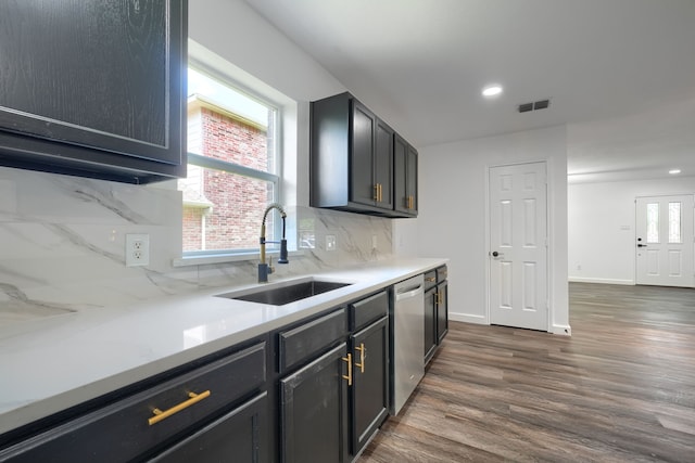 1722 Harvest Crossing Dr, Wylie, TX 75098 - kitchen featuring a sink, stainless steel dishwasher, tasteful backsplash, dark wood-type flooring, and recessed lighting