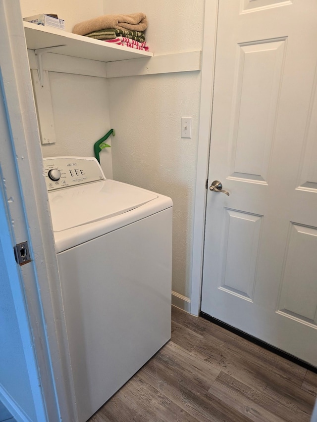 220 Bluebird Cir, Denton, TX 76209 - washroom featuring washer / clothes dryer and dark wood-style flooring