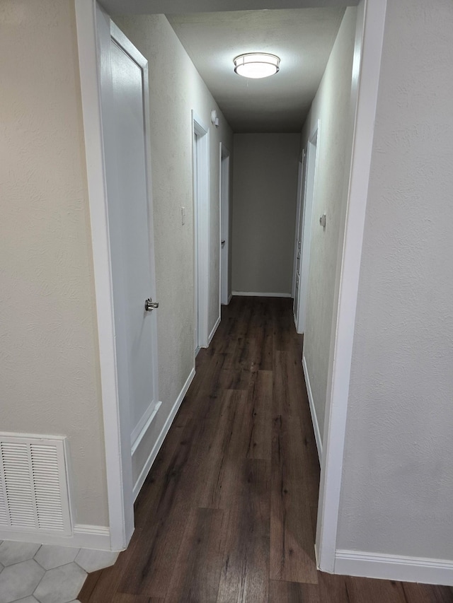 220 Bluebird Cir, Denton, TX 76209 - hallway with wood finished floors