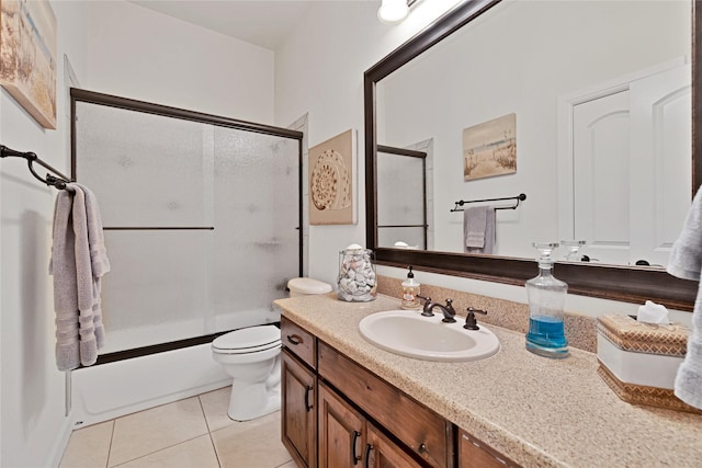 7100 King Ranch Rd, North Richland Hills, TX 76182 - full bathroom featuring tile patterned flooring, vanity, toilet, and bath / shower combo with glass door