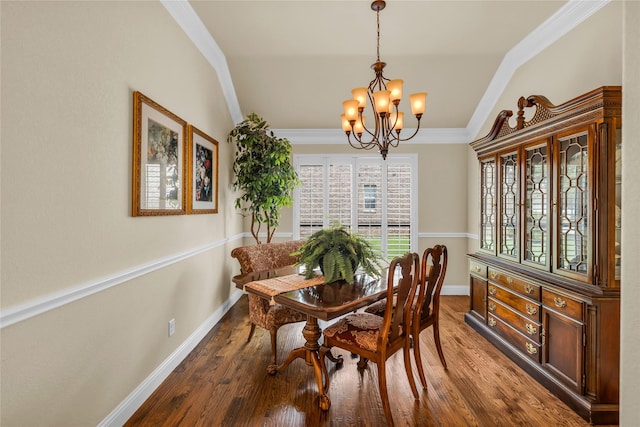 7100 King Ranch Rd, North Richland Hills, TX 76182 - dining room with a chandelier, wood finished floors, baseboards, and crown molding