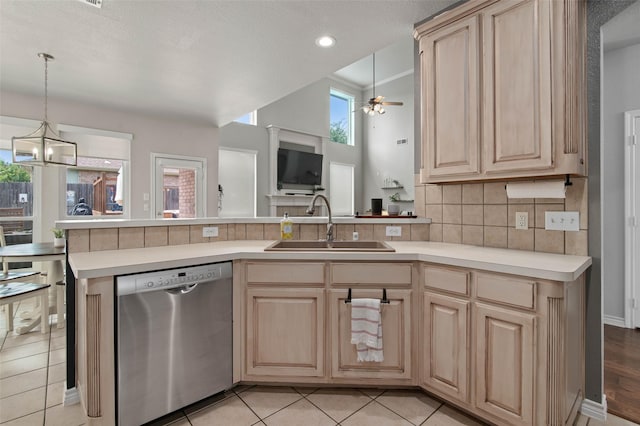 103 Daisey Ln, Justin, TX 76247 - kitchen featuring dishwasher, a sink, light brown cabinetry, light countertops, and ceiling fan