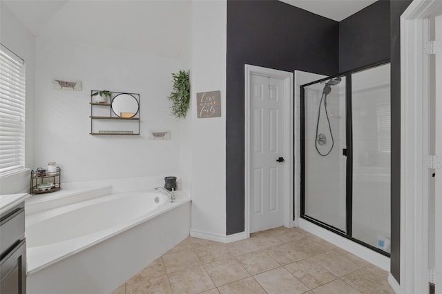 103 Daisey Ln, Justin, TX 76247 - bathroom featuring a stall shower, a bath, vanity, and tile patterned flooring