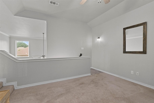 103 Daisey Ln, Justin, TX 76247 - empty room with ceiling fan, carpet flooring, vaulted ceiling, and baseboards