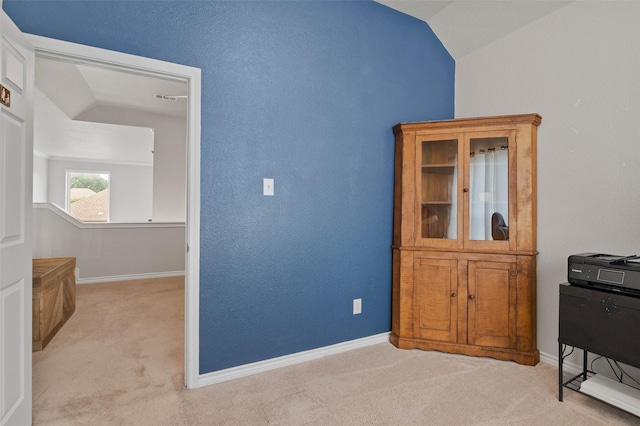 103 Daisey Ln, Justin, TX 76247 - office area featuring light colored carpet, lofted ceiling, and baseboards