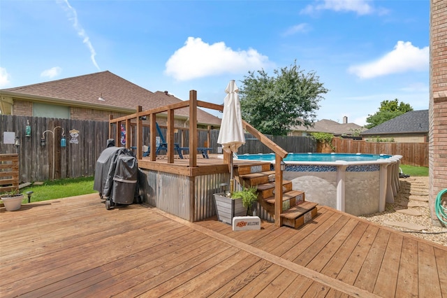 103 Daisey Ln, Justin, TX 76247 - wooden terrace with a fenced backyard